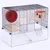 Small animal cage with metal grid, red exercise wheel, wooden house and ramps. Lower section made of glass for extra space.