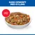 Skål med gryderet. Tekst: Sund opskrift med kylling, lækker stew. Skål med gryderet. Tekst: Sund opskrift med kylling, lækker stew.