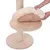 Instructions for attaching a padded cushion to a wooden platform of a scratching post. Cushion is secured with hook-and-loop fasteners.