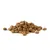 Pile of brown dry pet food kibble pieces on a white background. No visible packaging or branding.