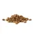 Pile of dry brown kibble pieces on a white background, no visible packaging or branding