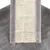 Scratching surface made of beige sisal fabric, bordered by grey plush material.