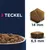 Croquettes pour chien avec mention « TECKEL », forme pentagonale, dimensions indiquées : 14 mm de large et 6,5 mm d’épaisseur, bol rempli de croquettes visible en bas à gauche.