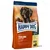 Hundfoderpåse med texten Happy Dog Supreme Sensible Toscana Ente & Lachs, Adult. Made in Germany. Endast 7,5 % fett. Inspirerat av Natural Life Concept.