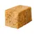 Bruin blok van geperst materiaal, mogelijk een snack of voedingssupplement voor dieren.