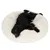 Black dog lying on a large, round, fluffy white pet bed, demonstrating the size and comfort of the product.