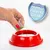 Hand pouring liquid from a small cup into a red bowl, with a shield icon showing the words 'Protect Prevent Clean'.