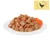 Close-up of wet food with meat pieces and carrots on a plate. Chicken symbol in the top right.