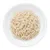 Shredded white meat served on a white plate, showing the texture and appearance of the food product.