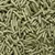Close-up of greenish-brown compressed food pellets, shown in bulk. No visible brand or packaging.