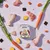 Naturediet Feel Good Senior Light food pack surrounded by visible ingredients including raw chicken, carrots, potatoes, rice grains and seaweed pieces.