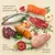 Ingrediente vizibile: pește întreg, file de somon, carne de vită, ficat, piept de pui, ou, cartof dulce, spanac, măr, ierburi. Text: conținut ridicat de carne, fără adaos de cereale.