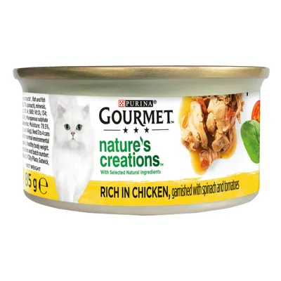 Gourmet Nature's Creations wet food, rich in chicken, garnished with spinach and tomatoes, 85g tin. Label shows selected natural ingredients.