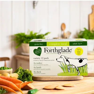 Forthglade variety 12 pack complete meal, grain free, for adult dogs over 1 year. Contains 4 turkey, 4 lamb, and 4 duck meals with vegetables. Made with natural ingredients.