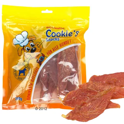 Påse med hundsnacks, märkt 'Cookie's Snacks', 'Hähnchenfilet', 'Für alle Hunde!', 200 g. Synliga kycklingfiléer bredvid förpackningen. Text på tyska.
