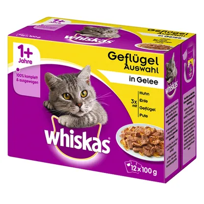 Caja de Whiskas Geflügel Auswahl in Gelee para gatos adultos, 12 sobres de 100 g. Variedades: pollo, pato, ave y pavo. Texto visible en alemán. Imagen de un gato gris y comida en gelatina.