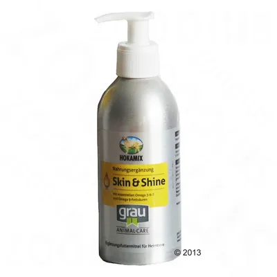 HOKAMIX Skin & Shine, grau ANIMAL-CARE, ravintolisä pumppupullossa. Teksti: mit essentiellen Omega 3-6-7 und Omega 9-Fettsäuren. Näkyvissä saksankielistä tekstiä.