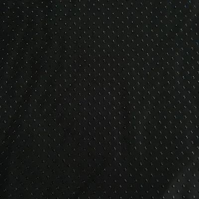 Tissu noir à petits points antidérapants visibles, matière synthétique