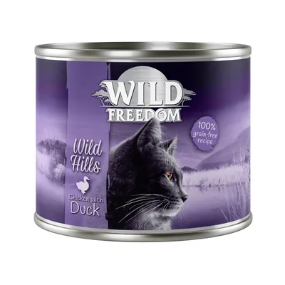Wild Freedom Wild Hills chicken with duck, 100% grain-free recipe, shown on product tin.