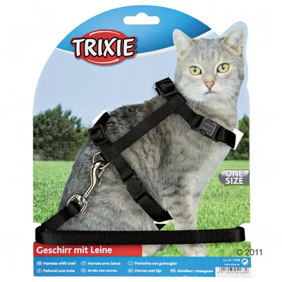 Harnais avec laisse pour chat Trixie, taille unique, visible sur l’emballage avec texte multilingue « Geschirr mit Leine » et mention « One Size ». Boucles en plastique, mousqueton métal.