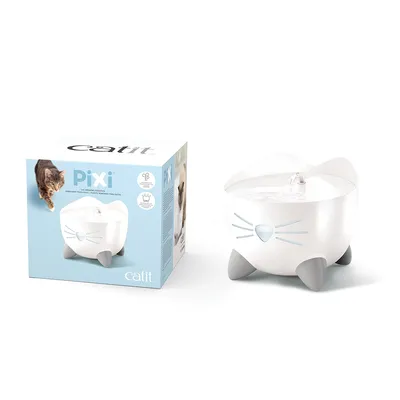 Catit Pixi fântână de apă pentru pisici, albă, cu ambalaj. Ambalajul arată imaginea produsului și o pisică. Numele mărcii Catit este vizibil.