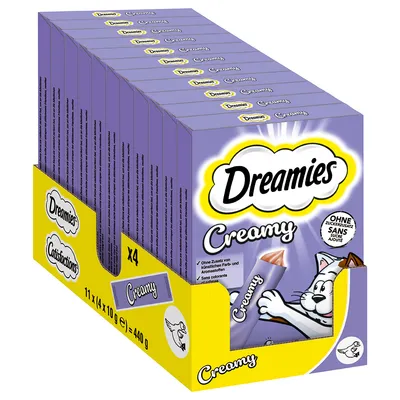 Boîte de 11 x 4 sachets Dreamies Creamy, 440 g. Texte visible : sans sucres ajoutés, sans colorants artificiels. Illustration d’un chat sur l’emballage.