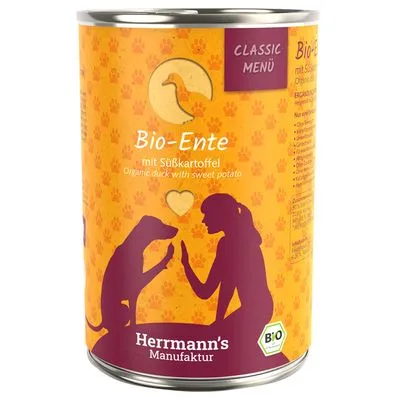 Herrmann's Manufaktur Bio-Ente met zoete aardappel, Classic Menü. Tekst: Organic duck with sweet potato. BIO-keurmerk zichtbaar op het blik.