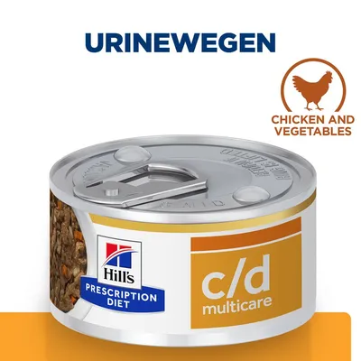 Hill's Prescription Diet c/d Multicare natvoer blik, tekst: URINEWEGEN, Chicken and Vegetables. Blik met afbeelding van kip en groenten op het etiket.