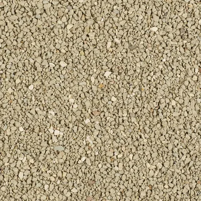Närbild av beige kattsand med fin kornstorlek.