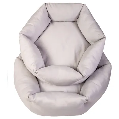 Panier pour animaux de compagnie gris clair, rembourré, avec bords souples et forme ovale.