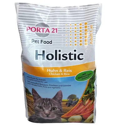 Porta 21 Pet Food Holistic Huhn & Reis Adult Cat, alimento completo per gatti con pollo e riso, erbe, frutta e verdura. Testo in tedesco e inglese visibile sulla confezione.