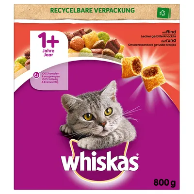 Ambalaj Whiskas 800 g, hrană uscată pentru pisici adulte 1+ ani, cu imagine de pisică, text vizibil: 'mit Rind', 'recycelbare Verpackung', bucăți crocante umplute, fundal mov.