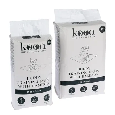 Две опаковки kooa Puppy Training Pads with Bamboo, 30 броя. Размери: M 45×30 см и L 60×45 см. Видими пиктограми: с бамбук, непропускливи, със самозалепваща лента.