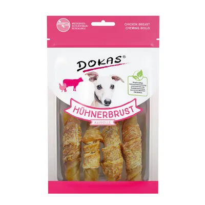 Envase de Dokas Hühnerbrust Kaurolle con rollos masticables visibles. Texto en inglés: Chicken Breast Chewing Rolls. Envase resellable, imagen de perro y texto informativo en alemán.