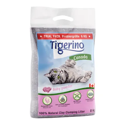 Arena aglomerante para gatos Tigerino Canada Baby powder, 6 kg. Aroma a talco, 350% absorción, 99% sin polvo, aglomera al instante. 100% arcilla natural. Texto en inglés y alemán.
