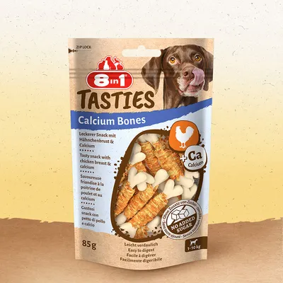 8in1 Tasties Calcium Bones, friandise à la poitrine de poulet et calcium, 85 g, facile à digérer, sans sucre ajouté, pour chiens 1–10 kg. Texte en anglais, allemand, français, italien.