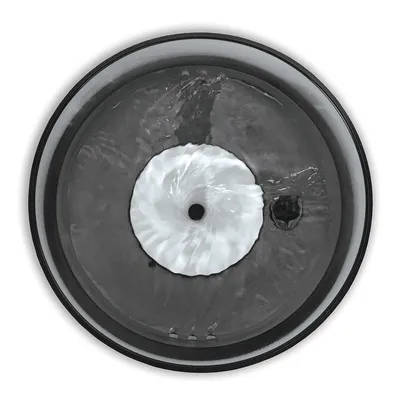 Round drinking fountain design with water vortex in the centre, black rim and clear water flow visible.