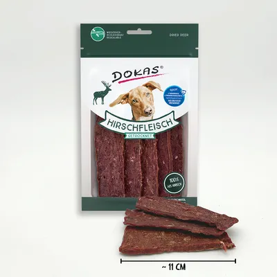 Dokas Hirschfleisch Getrocknet, viande de cerf séchée en lamelles, 100 % aus Hirsch, sachet refermable, environ 11 cm de long. Texte en allemand et anglais sur l'emballage.