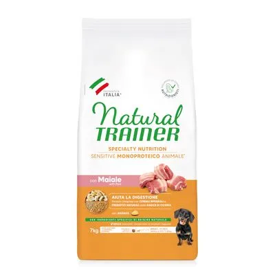 Zak Natural Trainer Specialty Nutrition Sensitive Monoproteico Animale met varkensvlees, 7 kg. Tekst: Aiuta la digestione, con ingredienti speciali di origine naturale. Afbeelding van hond.