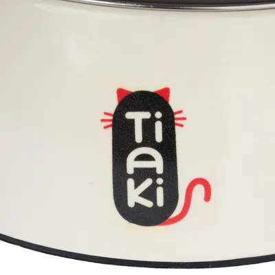 Tiaki logo with cat ears, whiskers and red cat tail on white background.