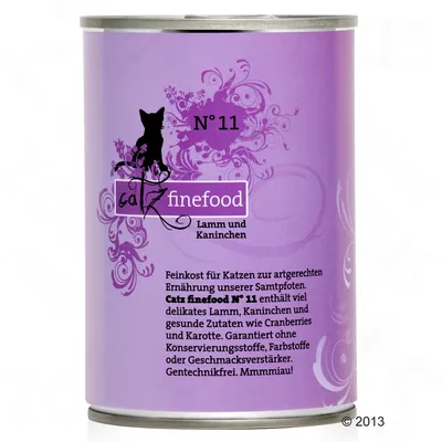 Консерва Catz finefood N°11 за котки, агнешко и заешко. Текст на немски: без консерванти, оцветители, овкусители, ГМО. Съставки: агнешко, заешко, червена боровинка, морков.