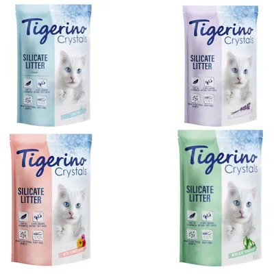 Cztery opakowania żwirku Tigerino Crystals Silicate Litter 5 l, różne warianty: classic, lavender, flower scent, aloe vera; widoczne ikony: lekki, pochłania zapachy, bezpyłowy.