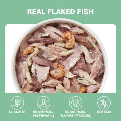 REAL FLAKED FISH. NO GLUTEN, NO ARTIFICIAL PRESERVATIVE, NO ARTIFICIAL FLAVORS OR COLORS, NON GMO feliratok angolul, tálban haldarabok és garnéla látható.