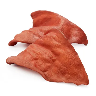 Three large, dried animal ears displayed on a white background, showing their size and texture as a natural chew treat.
