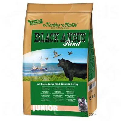 Sacchetto Markus-Mühle Black Angus Rind Junior 15 kg, testo visibile: mit Black Angus Rind, Ente und Hering. Immagine di mucca nera, cane, barca e uccelli.