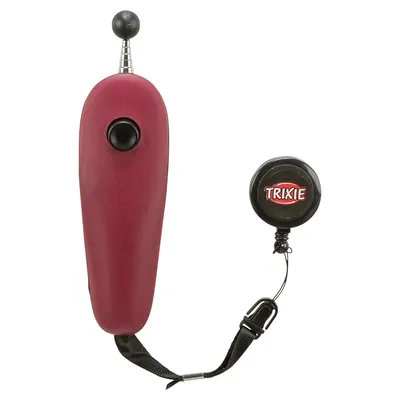 Trixie clicker with red handle and extendable attachment cord, suitable for animal training.