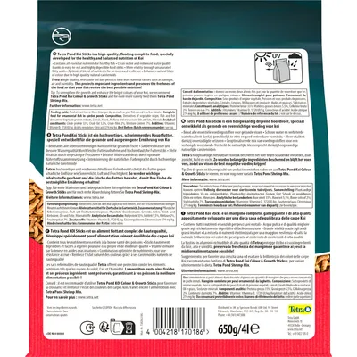 Back of Tetra Pond Koi Sticks 650g/4l pack with feeding guide, ingredients, and product info in multiple languages. Barcode, recycling symbols, and Tetra logo visible.