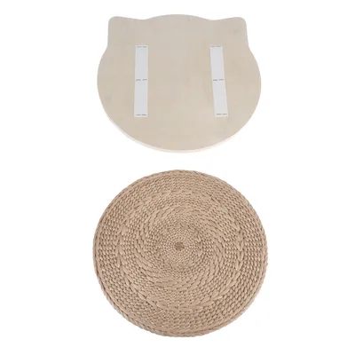 Wooden board in cat head shape with two adhesive strips and round braided mat made of natural materials.