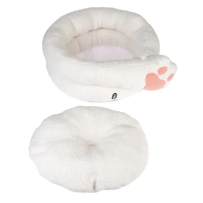 White, round pet bed with removable cushion and pink paw print design. Fluffy material, suitable for comfort and warmth.