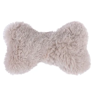 Soft, beige plush toy in bone shape.